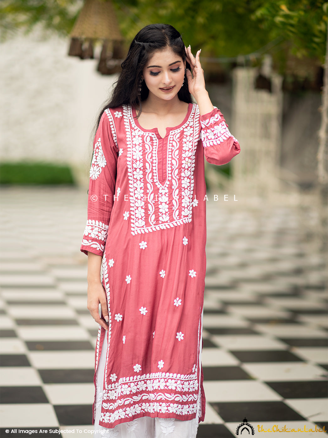 Hand-embroidered coral muslin kurti with Lucknowi motifs