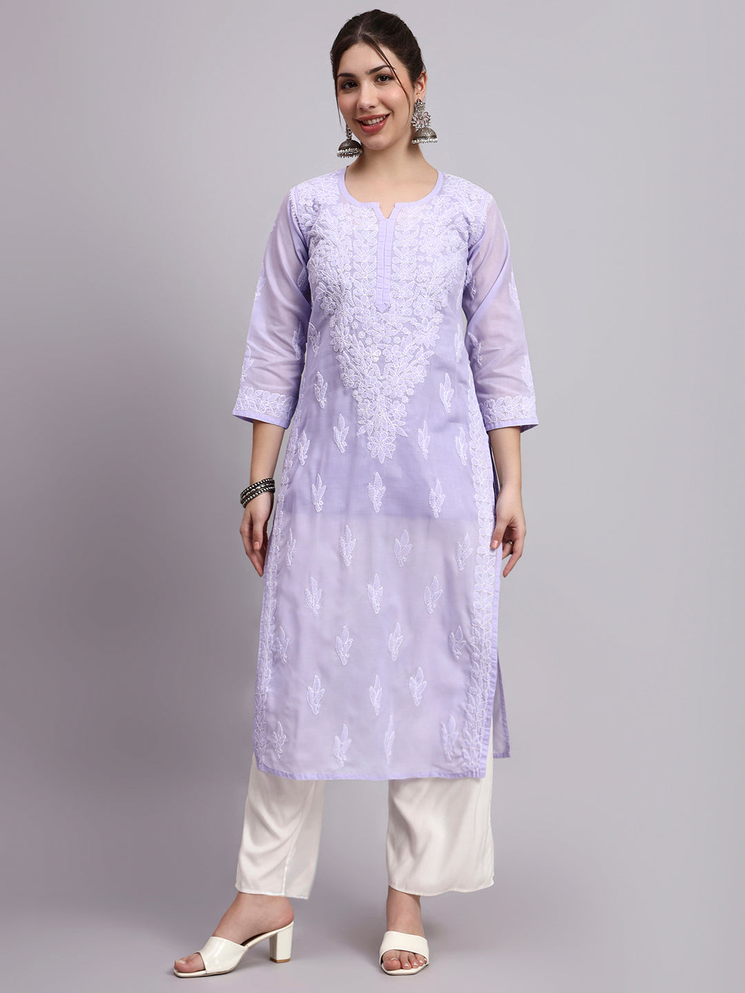 Straight fit Chikankari cotton kurti paired with pants showcasing minimal and elegant ethnic wear for women