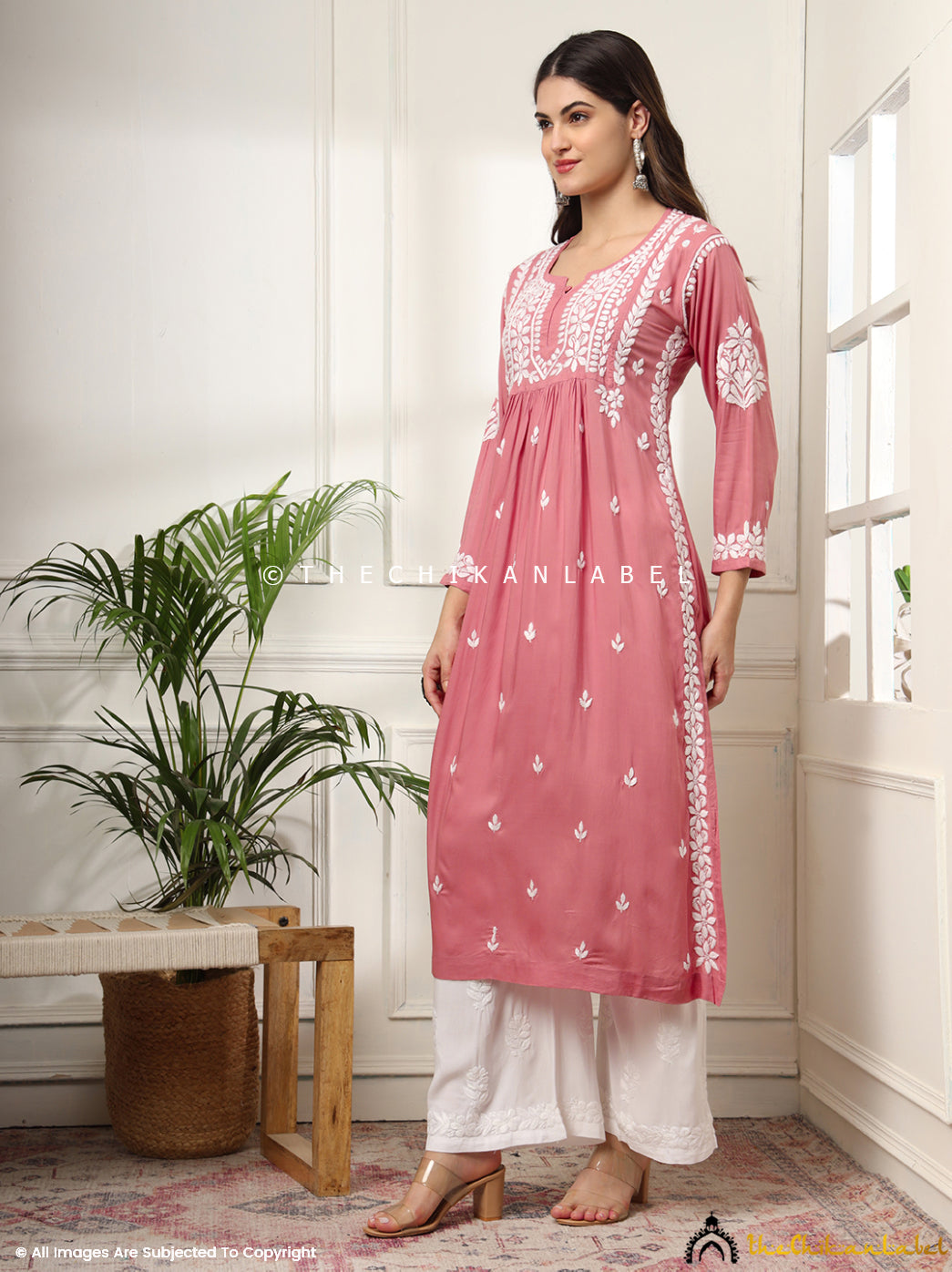 Lightweight rayon kurti in coral with white floral motifs