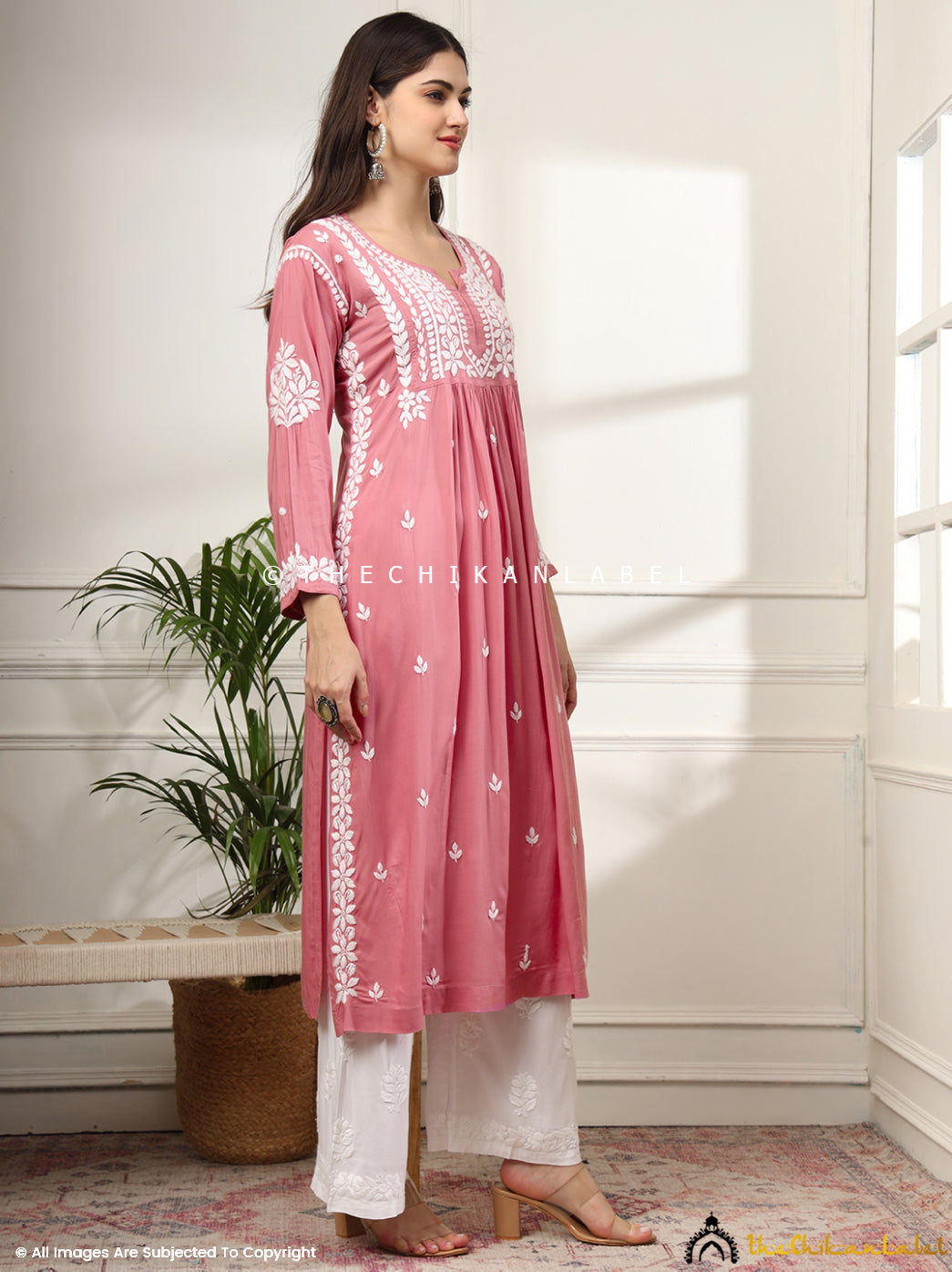 Handcrafted coral chikankari kurti in soft rayon fabric