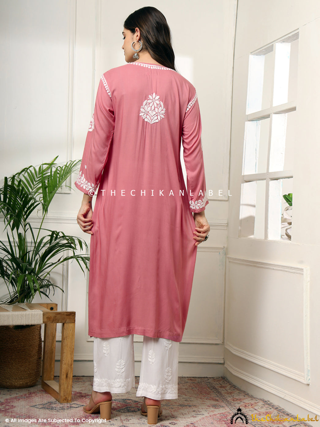 Ethnic coral kurti styled with white palazzo pants