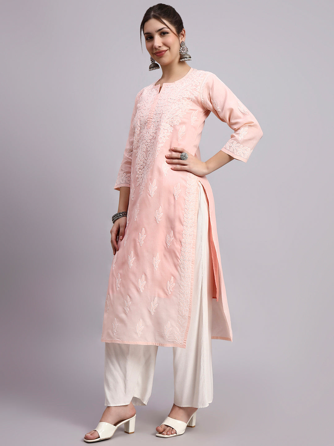 Straight cut women kurta with intricate embroidery work and breathable cotton fabric for daily fashion