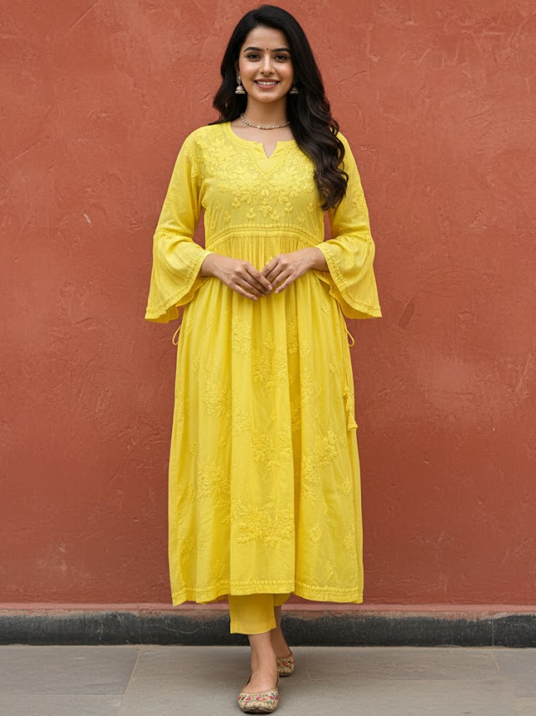 Yellow Mulmul Chikankari A-Line Kurti