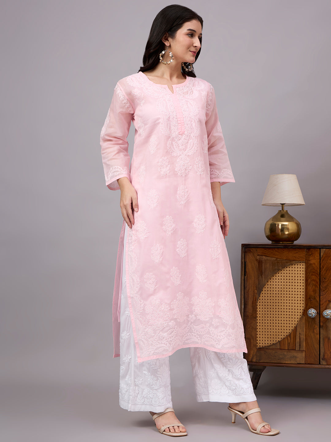 Comfortable regular wear Chikankari Kurta made from premium cotton fabric with handcrafted embroidery and an attached inner for enhanced comfort and coverage.