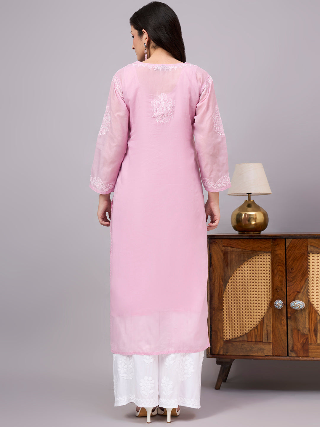 Elegant Chikankari Kurta crafted from premium cotton with a soft attached inner, showcasing traditional Lucknow embroidery for timeless ethnic fashion.