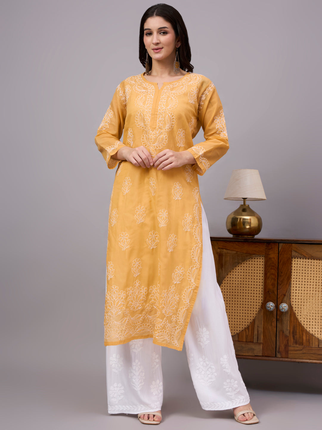 Women's Cotton Straight Kurti with authentic handcrafted Chikankari embroidery and soft inner lining, designed for comfortable regular wear, office wear, and casual ethnic styling.