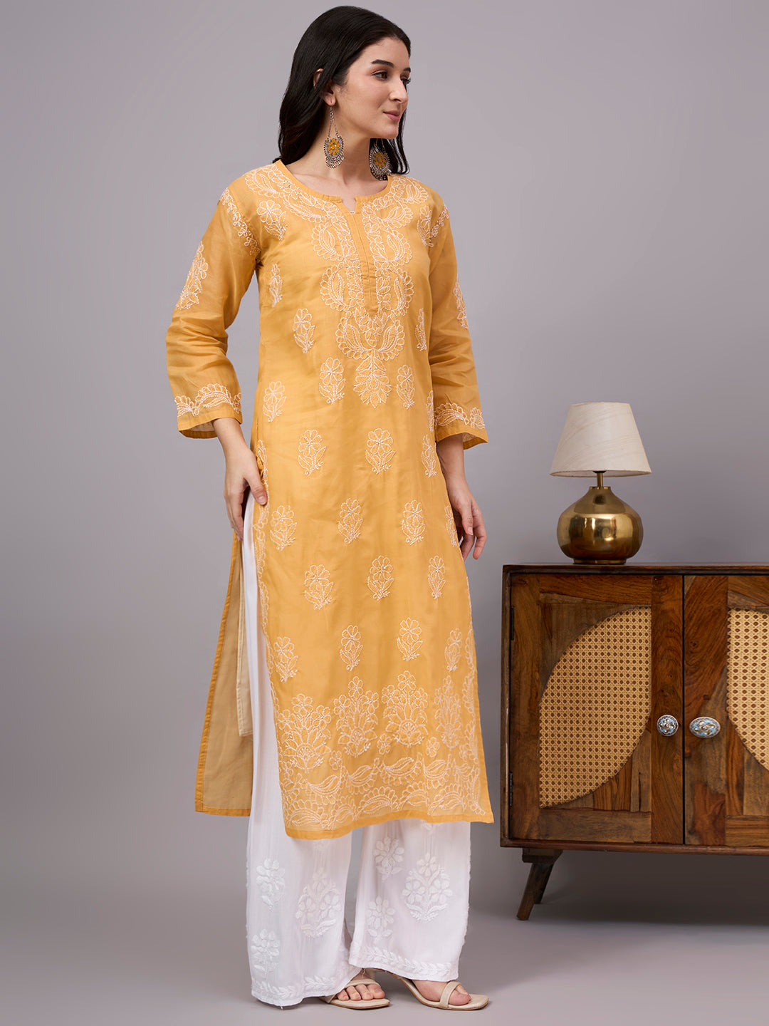 Traditional Cotton kurta with inner featuring artisan-crafted Chikankari embroidery, straight-cut design, and lightweight comfort for modern ethnic wardrobes.