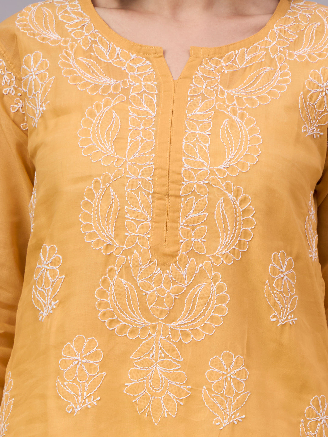 Premium Cotton kurta with inner featuring intricate handcrafted Chikankari embroidery, breathable cotton fabric, and a flattering straight silhouette for everyday elegance.