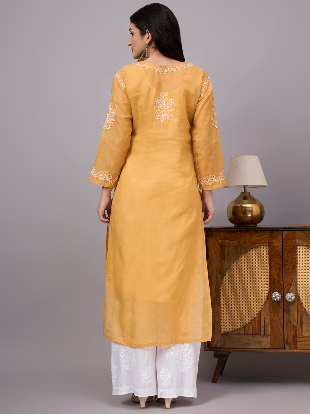 Elegant Chikankari Kurta crafted from premium cotton with a soft attached inner, showcasing traditional Lucknow embroidery for timeless ethnic fashion.