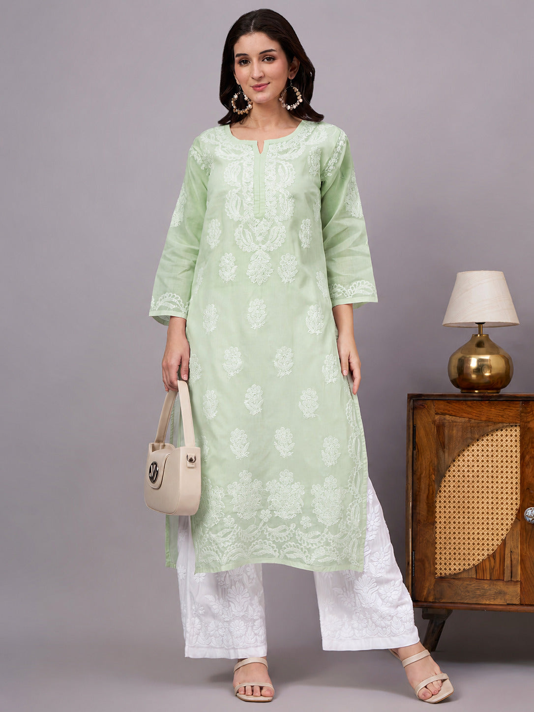 Handcrafted Chikankari Kurta with intricate traditional embroidery, premium cotton fabric, and comfortable straight silhouette ideal for office wear and casual outings.