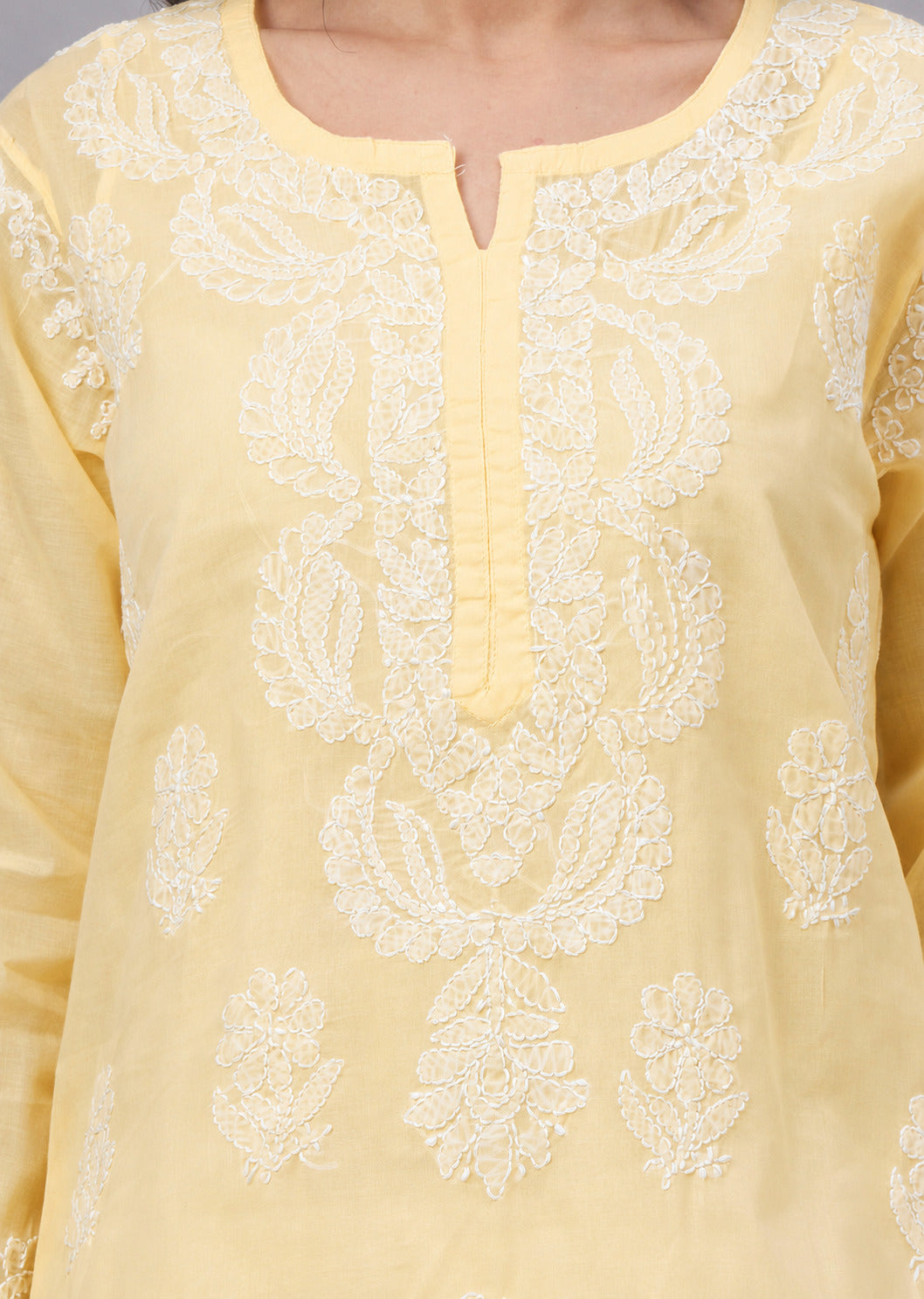 Comfortable regular wear Chikankari Kurta made from premium cotton fabric with handcrafted embroidery and an attached inner for enhanced comfort and coverage.
