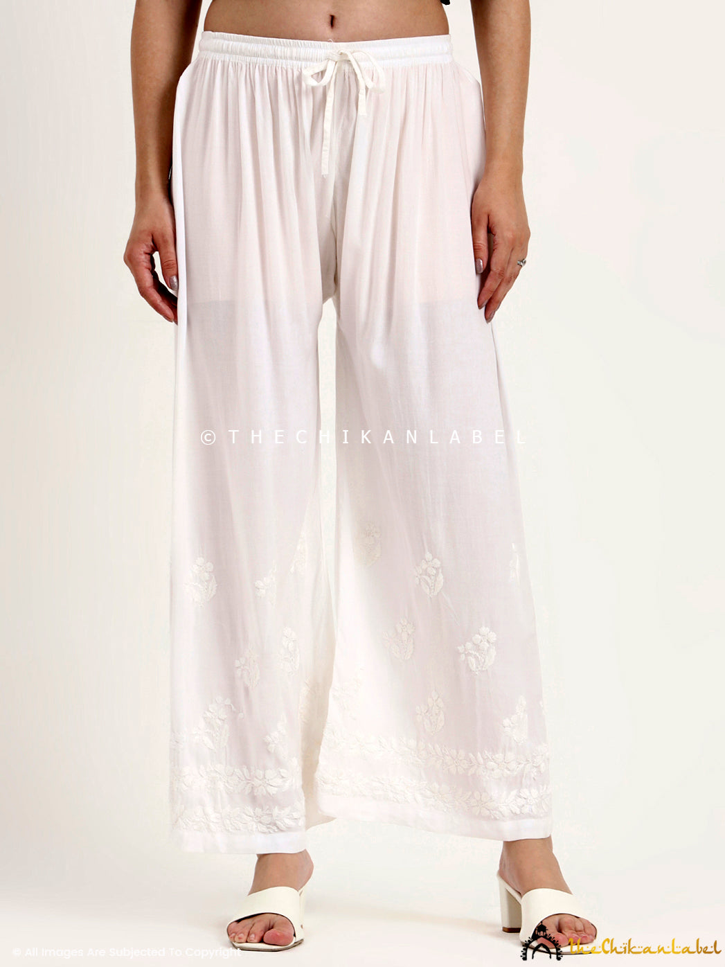 Premium rayon straight palazzo with intricate chikankari embroidery for women’s ethnic wear.