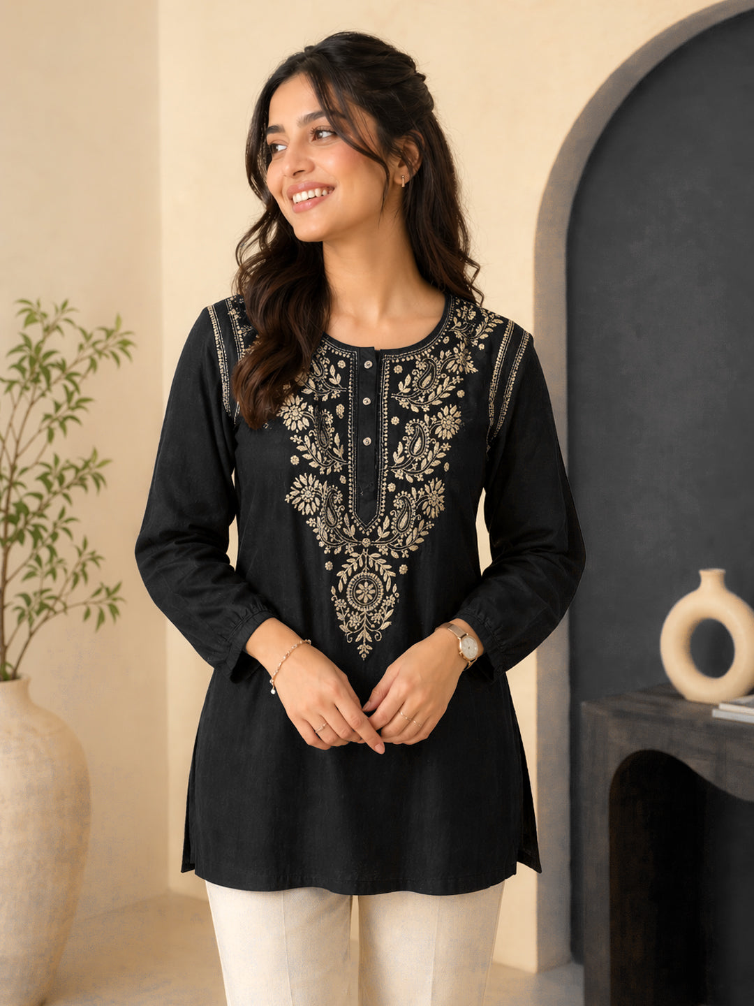 Elegant chikankari embroidered kurti for women featuring intricate floral and paisley hand embroidery with a straight silhouette and round neckline for everyday ethnic wear.