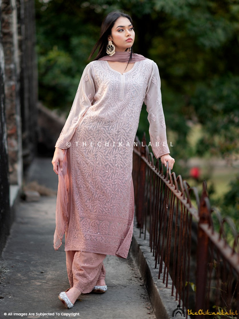 Trending luxury viscose set with chikankari kurti, flowy palazzo, and matching dupatta, designed for modern ethnic wardrobes.