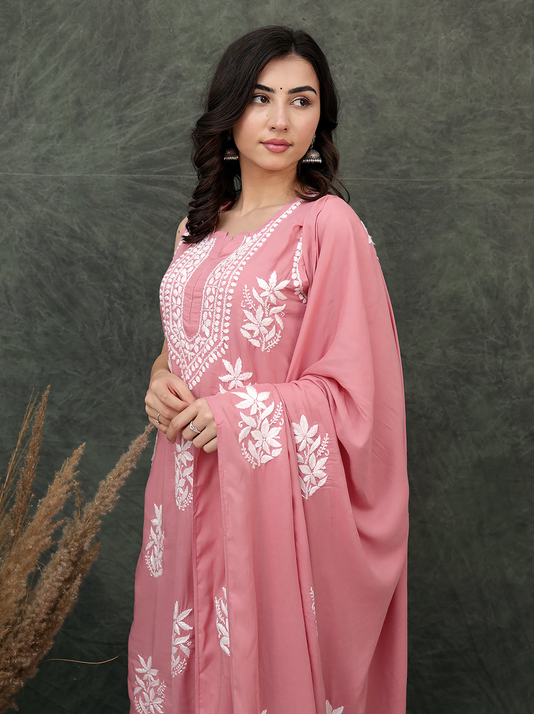 Elegant Lucknowi chikankari kurta ensemble showcasing fine hand embroidery craftsmanship, styled with straight fit pants and flowing dupatta