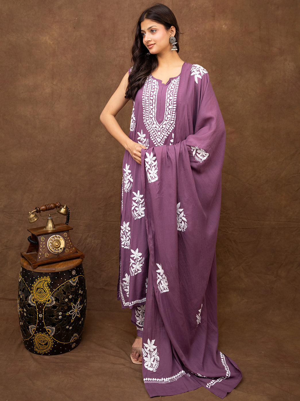 Premium chikankari embroidered kurta set crafted with traditional handwork, paired with matching pants and dupatta, offering timeless ethnic elegance