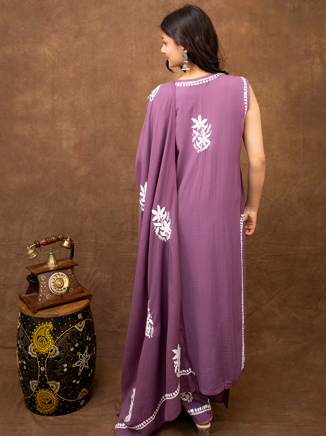 Traditional chikankari kurta set inspired by Lucknow craftsmanship, showcasing floral hand embroidery, coordinated pants, and flowing dupatta