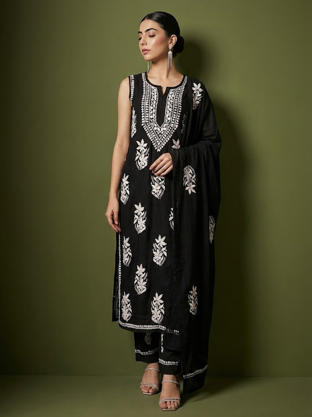 Authentic hand embroidered chikankari kurta set inspired by traditional Awadhi craftsmanship, featuring floral motifs and a graceful ethnic silhouette