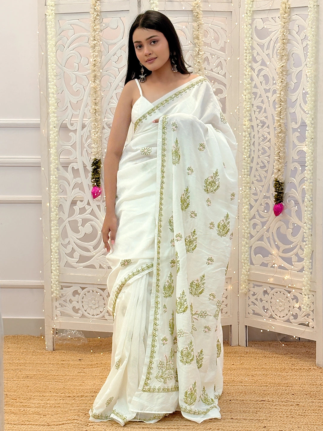 Traditional Lucknowi chikankari saree crafted on premium Chanderi fabric showcasing delicate embroidery artistry.