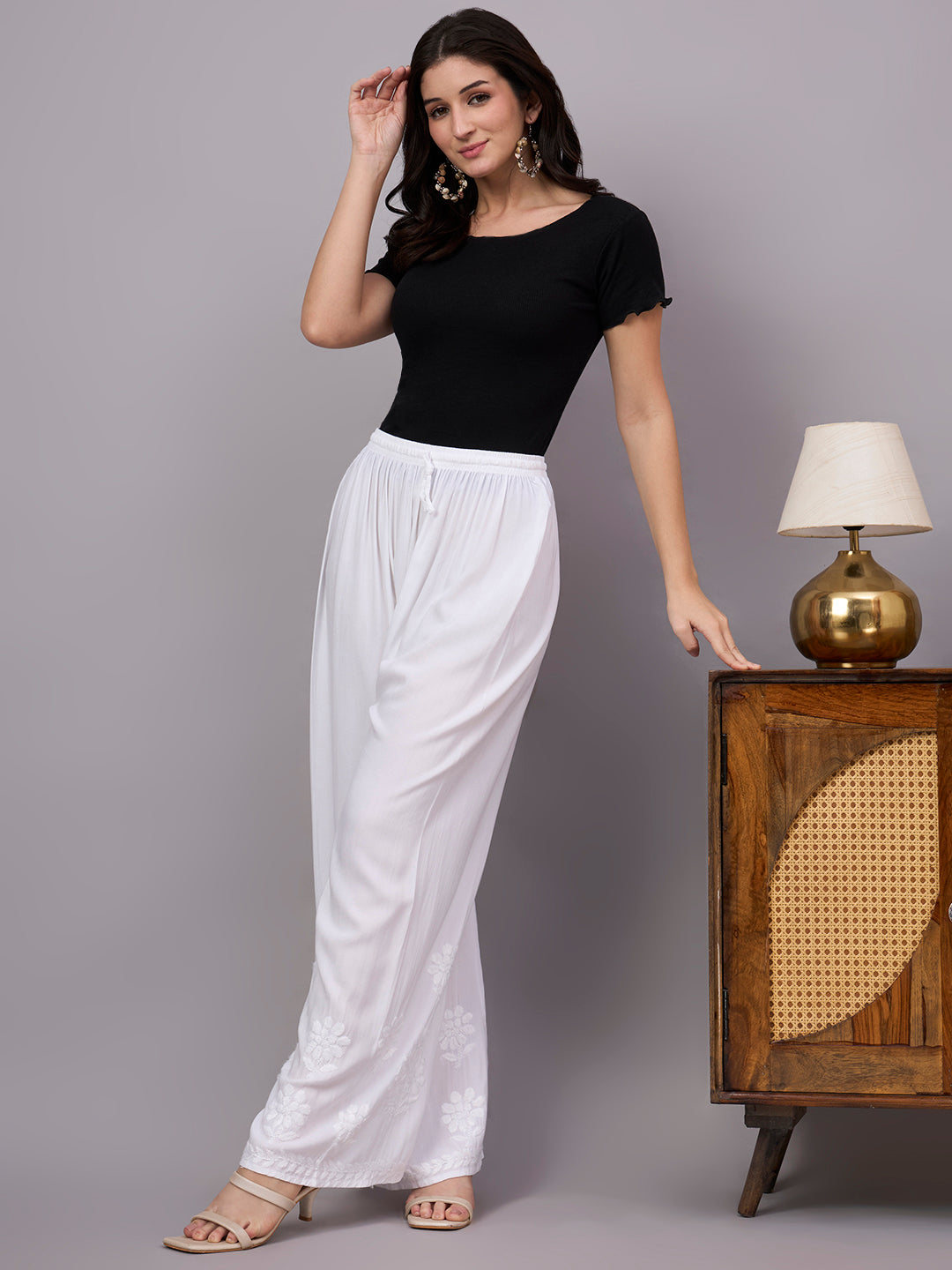 Comfortable regular wear bottom with beautiful Chikankari embroidery and straight fit silhouette perfect for daily ethnic outfits