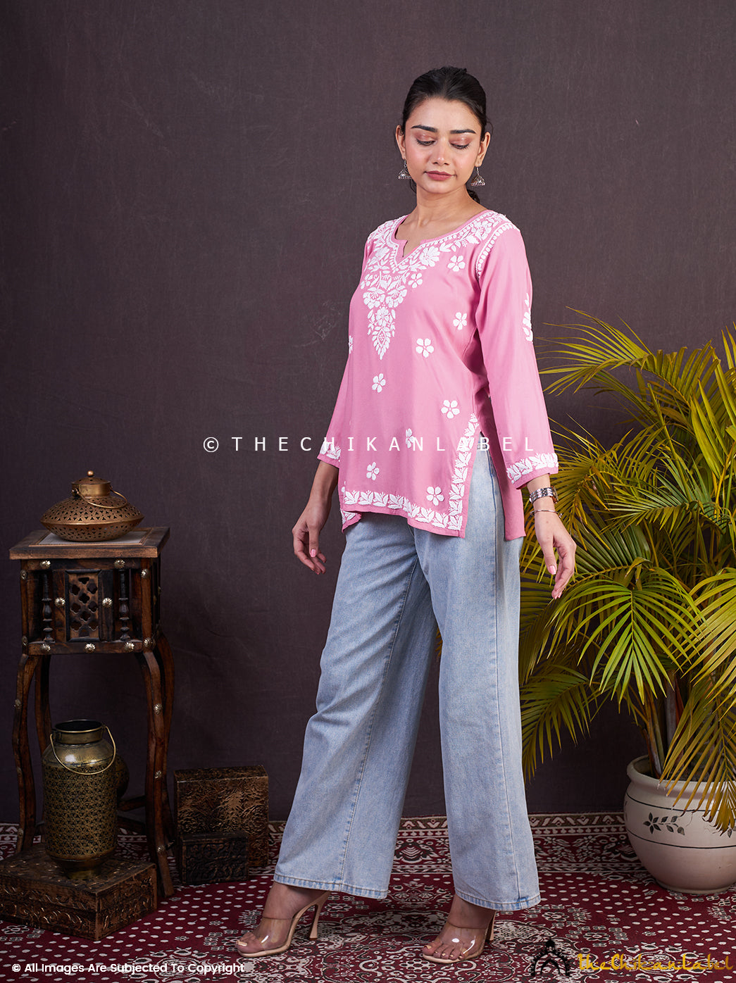 Soft pink short kurta with traditional Lucknowi chikankari