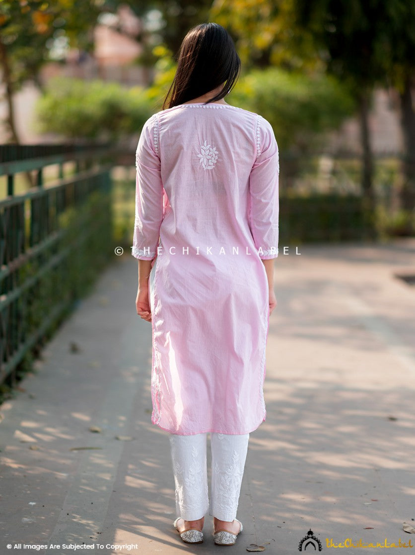 Elegant baby pink Chikankari kurta styled with white pants