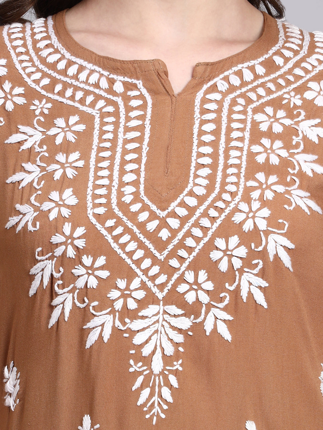 Rayon short kurta featuring authentic hand-embroidered chikankari work designed as a trending short top for women
