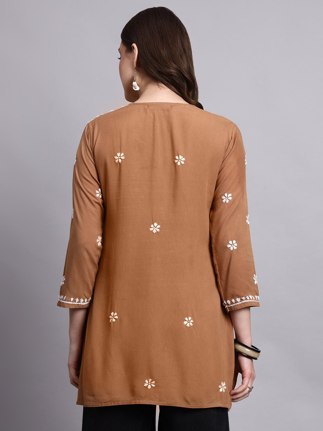 Women’s handmade chikankari short top with detailed embroidery on sleeves and front panel suitable for casual and office wear