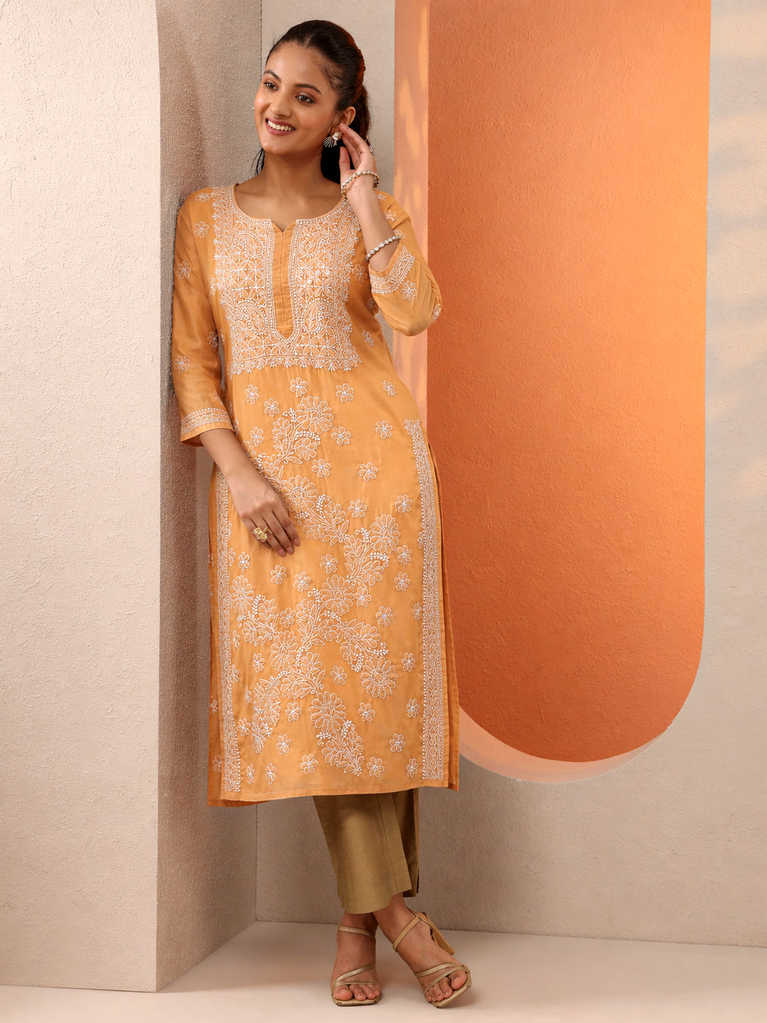 Elegant cotton straight kurti showcasing traditional chikankari work ideal for office wear and casual styling