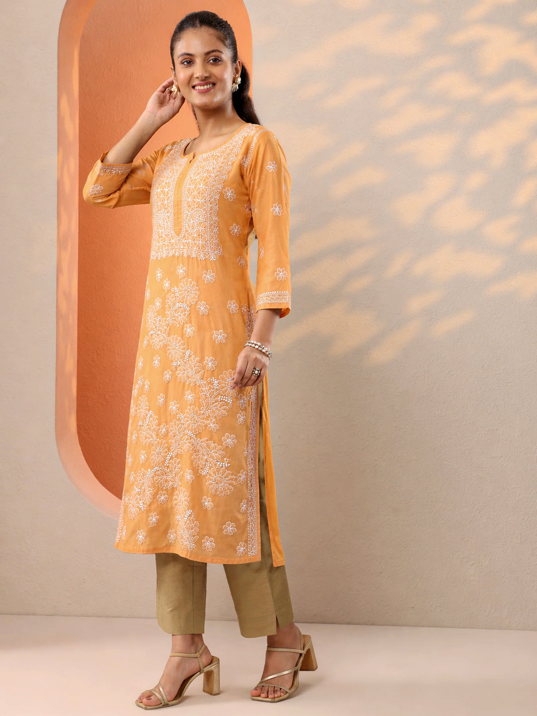 Ethnic chikankari kurta for women featuring straight cut and soft fabric suitable for summer and daily wear