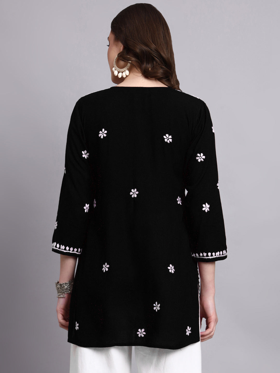 Women’s rayon short kurta with intricate chikankari embroidery suitable for summer wear and layering