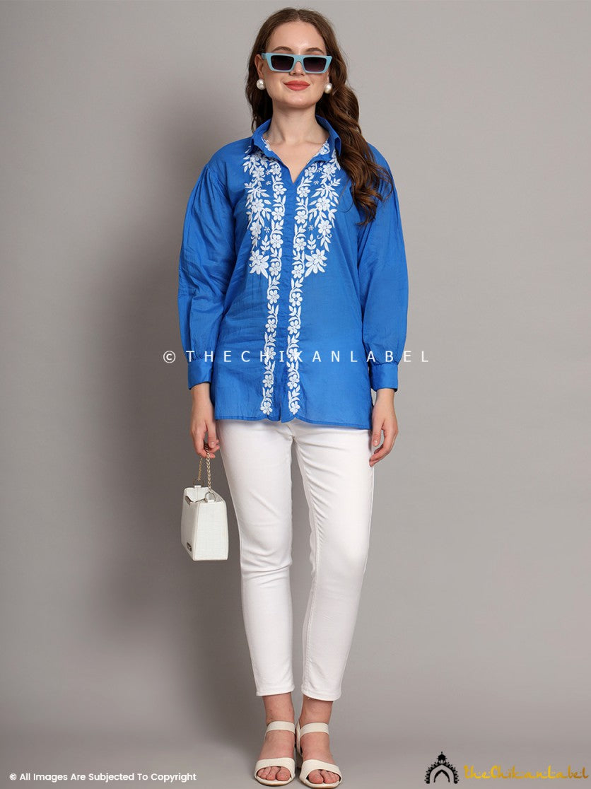 Woman wearing blue mulmul cotton chikankari shirt with white embroidery