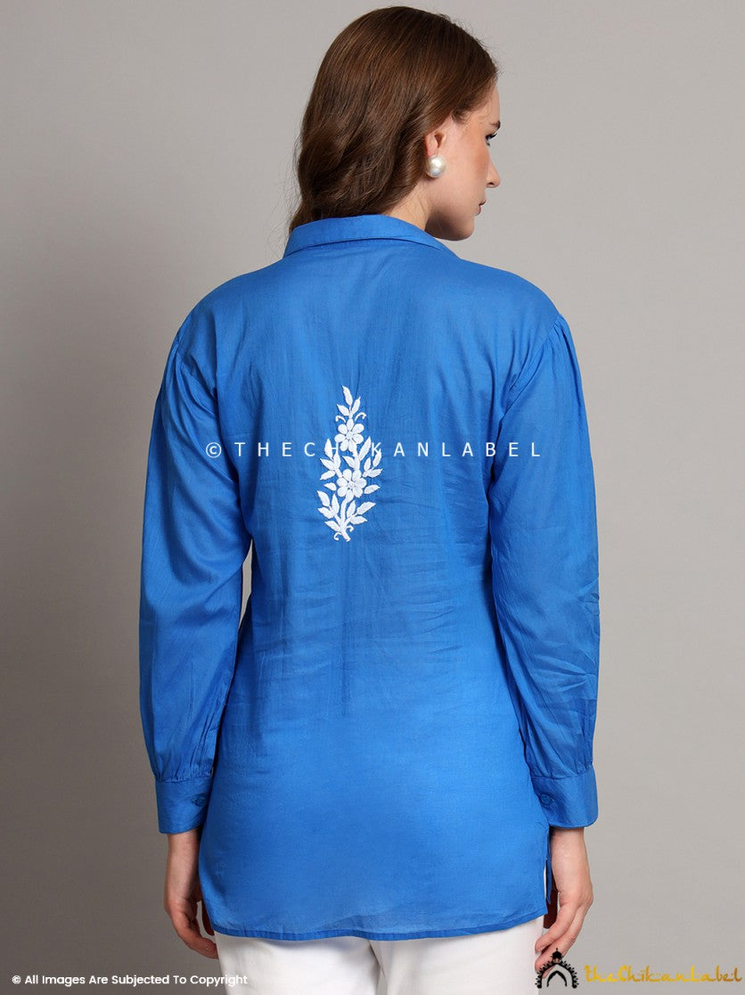 Back view of blue mulmul cotton chikankari shirt highlighting relaxed fit and clean stitching.