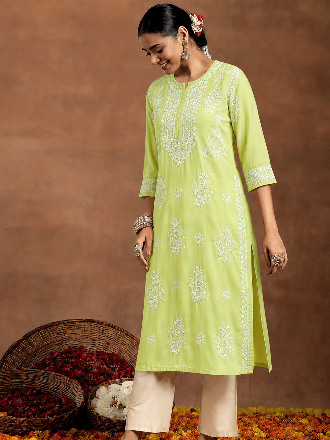 Trending Chhavi Cotton Straight Kurti for women featuring traditional Chikankari embroidery, straight fit, round neckline and comfortable inner for regular wear.