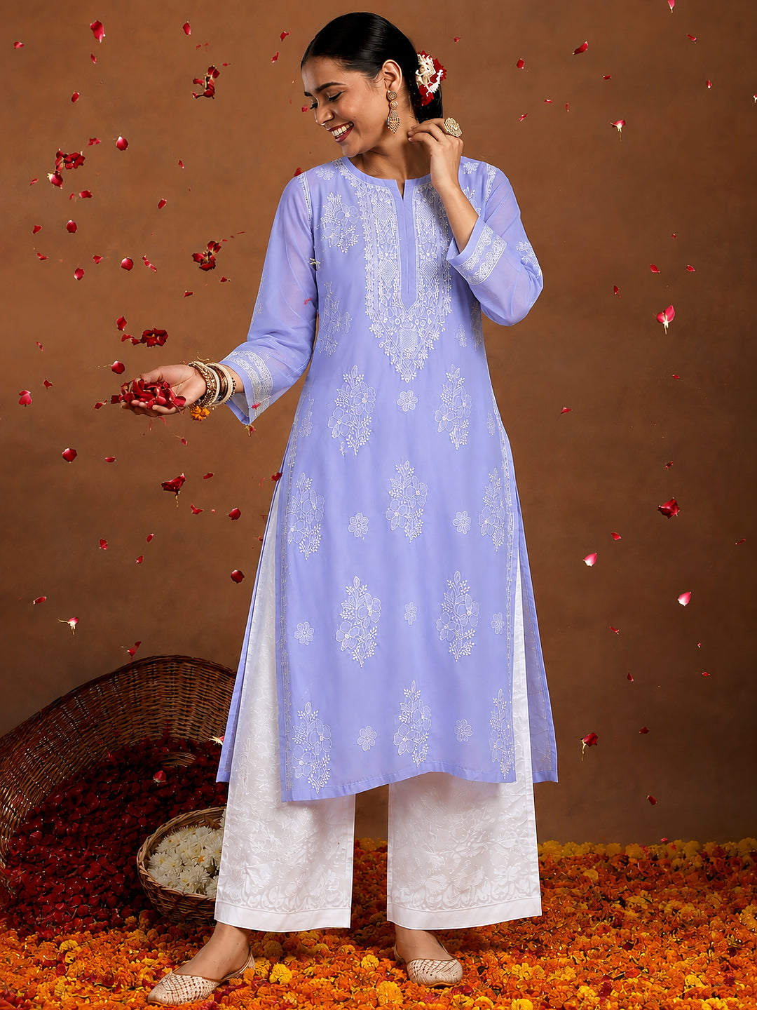 Chhavi Cotton Straight Kurti with elegant Chikankari embroidery on the neckline and body, paired with an inner for comfortable and versatile everyday styling.