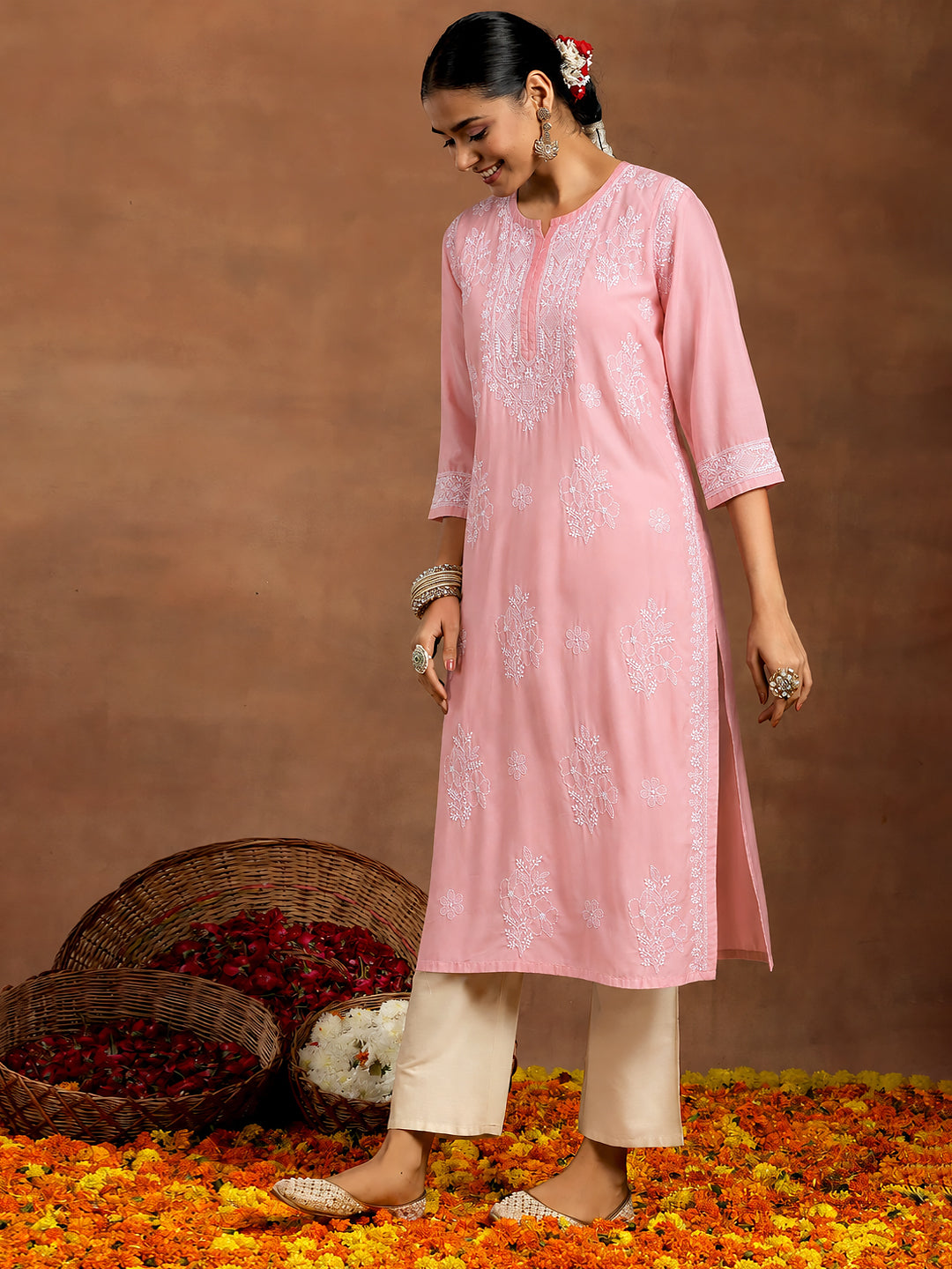 Classic women’s Chikankari straight kurti crafted from breathable cotton with an included inner, three-quarter sleeves and elegant embroidery for regular wear.