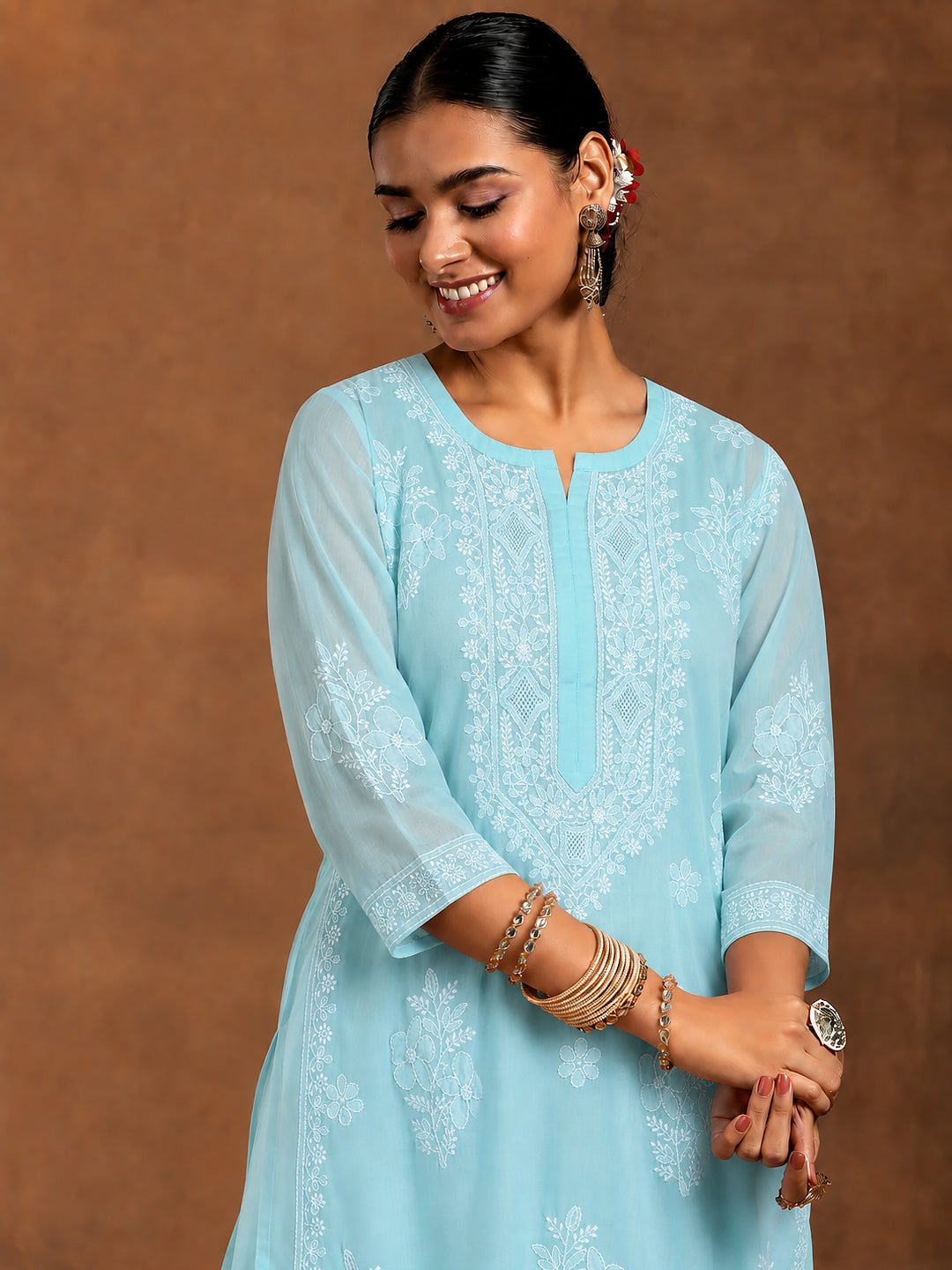 Women’s Chhavi Cotton Straight Kurti designed with elegant floral Chikankari embroidery, three-quarter sleeves and matching inner for everyday ethnic styling.