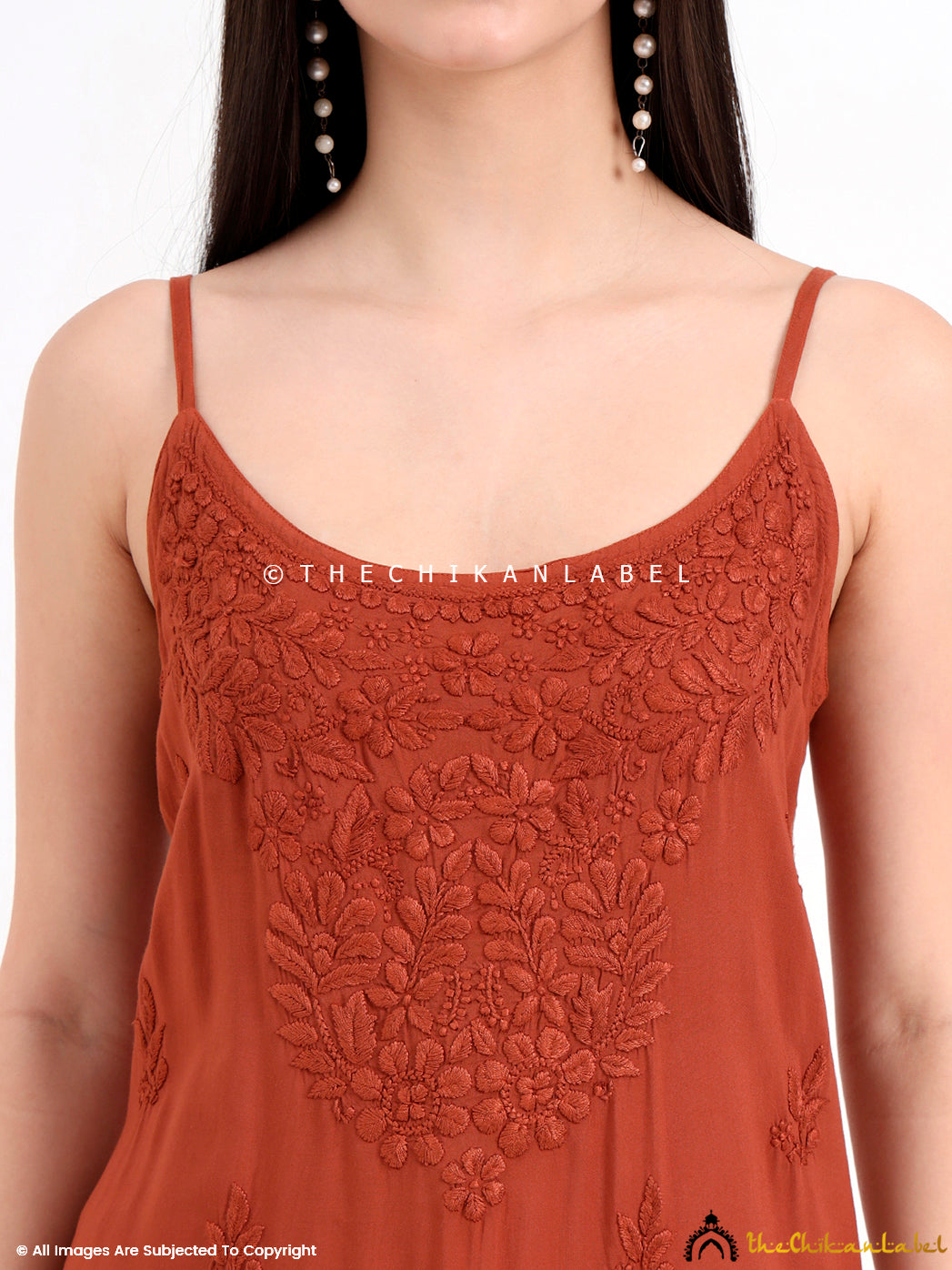 Office wear-ready chikankari strappy kurta in modal fabric, offering a breathable, flowy fit with artisan-crafted embroidery on the front.