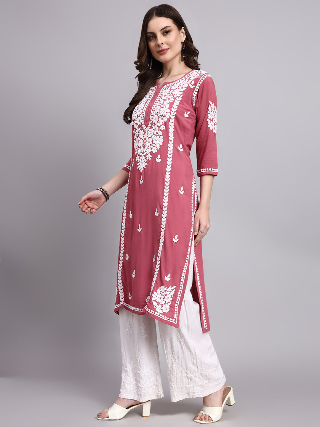 Elegant women’s rayon chikankari long kurta showcasing artisan hand embroidery on neckline sleeves and hemline