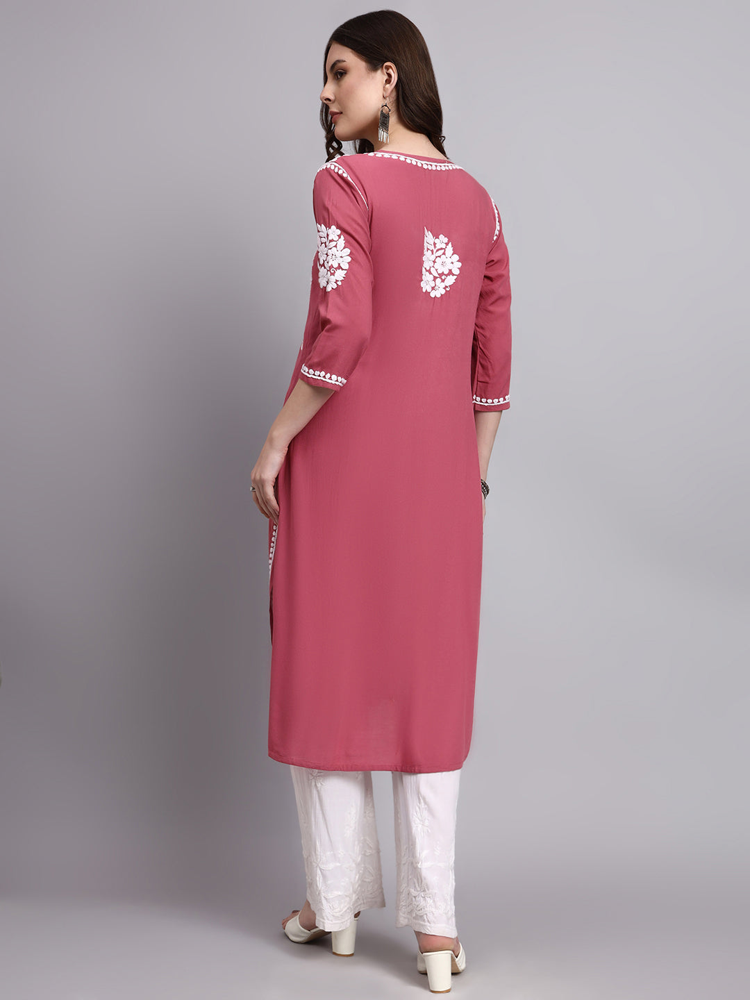 Traditional chikankari embroidered long kurti made from breathable rayon fabric styled with palazzo pants for everyday ethnic wear