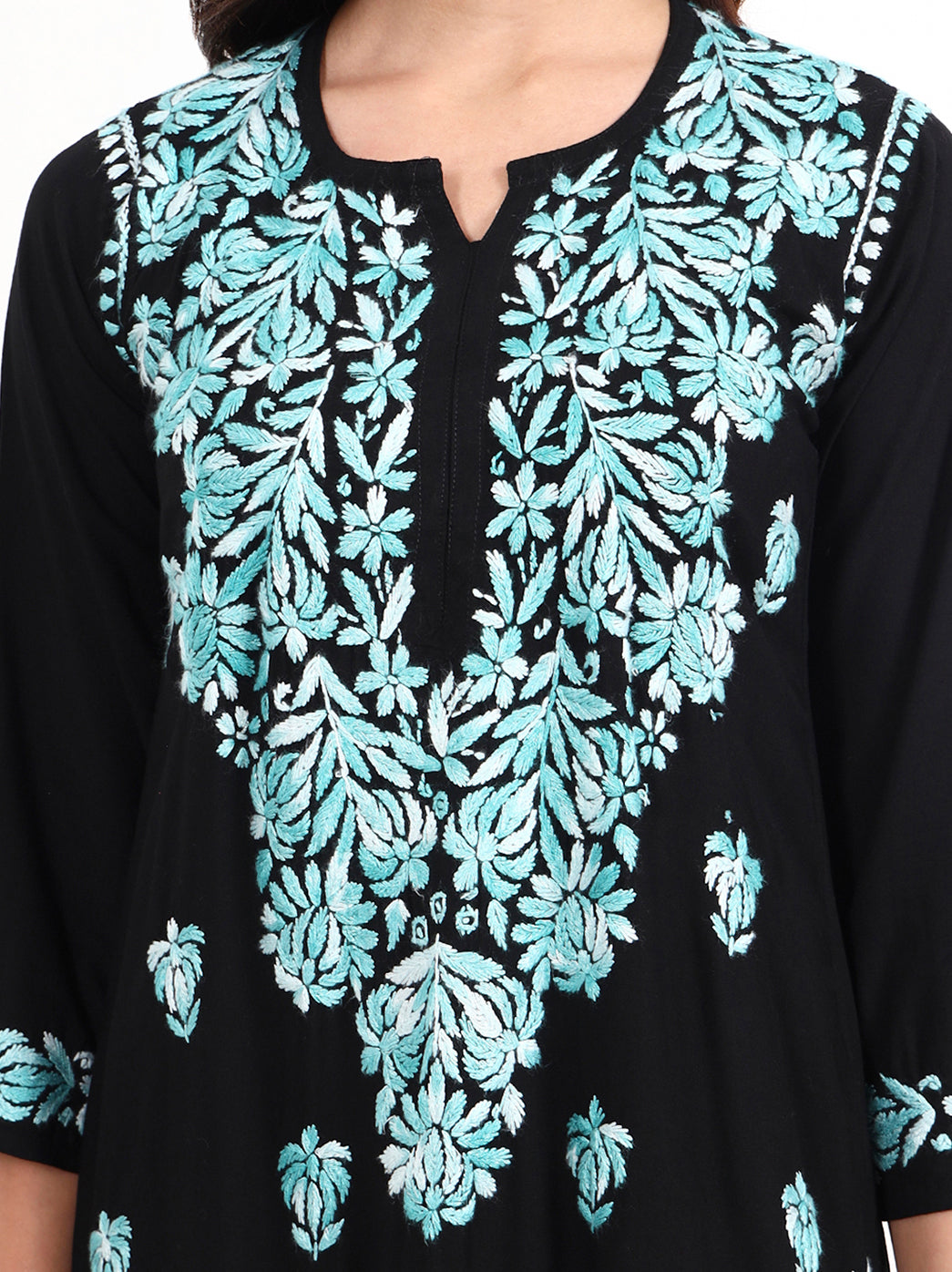 Straight cut chikankari kurti with matching palazzo showcasing detailed craftsmanship
