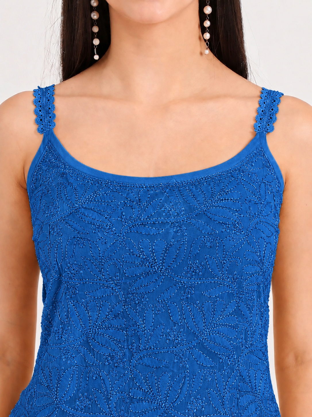 Comfortable embroidered viscose strappy kurti featuring a sleeveless design and modern silhouette for women looking for stylish regular wear outfits.