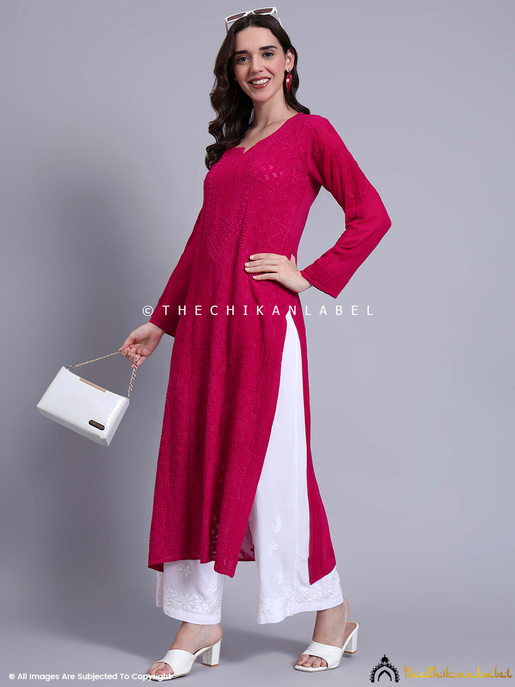 Studio photo of chikankari kurta with straight cut and high-quality fabric, perfect for workwear and events.