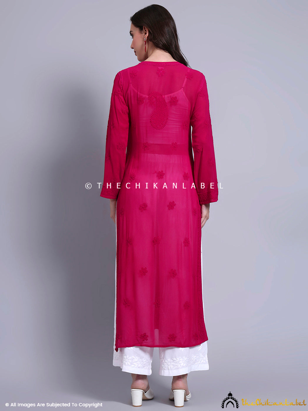 Model showcasing a full-sleeve chikankari straight kurti made from breathable viscose fabric, ideal for daily wear.