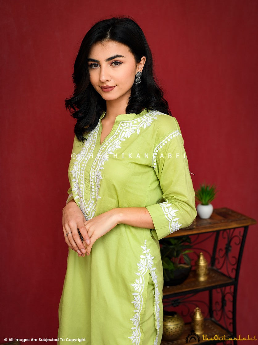 Radiate confidence in this pastel green Rumi Chikankari cotton set. Subtle and elegant embroidery makes it ideal for light festive or daywear.