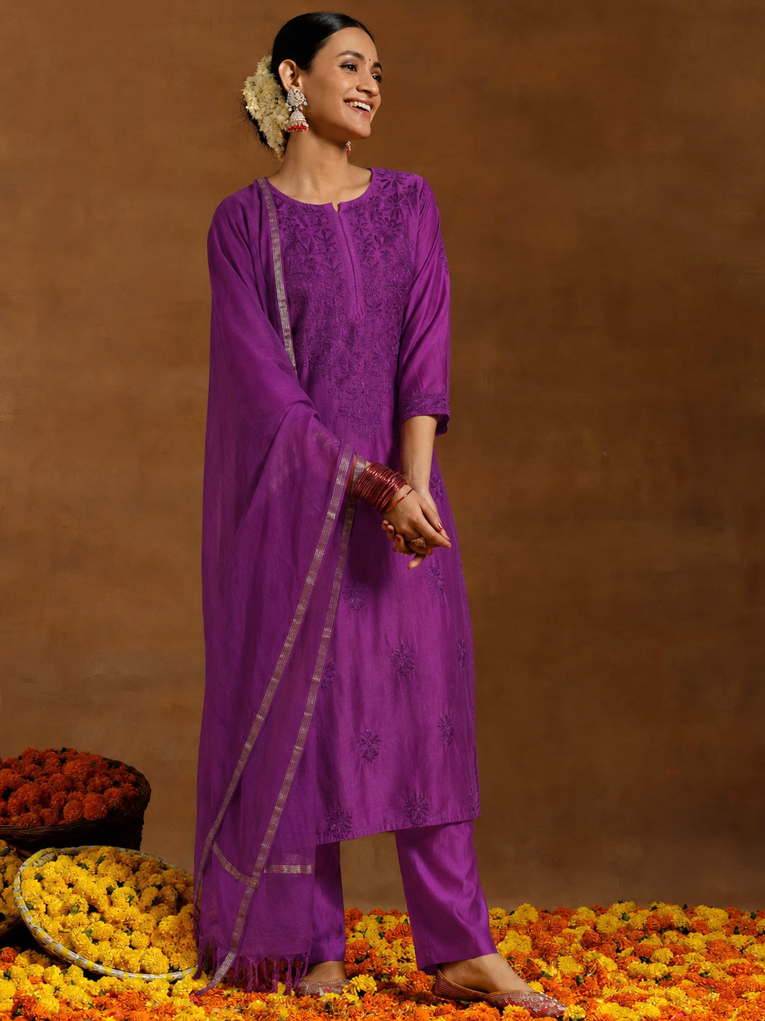 Women’s Hanshika Chanderi Kurta Set with Dupatta designed with an embroidered straight kurti, coordinated pants and lightweight dupatta for graceful ethnic wear.