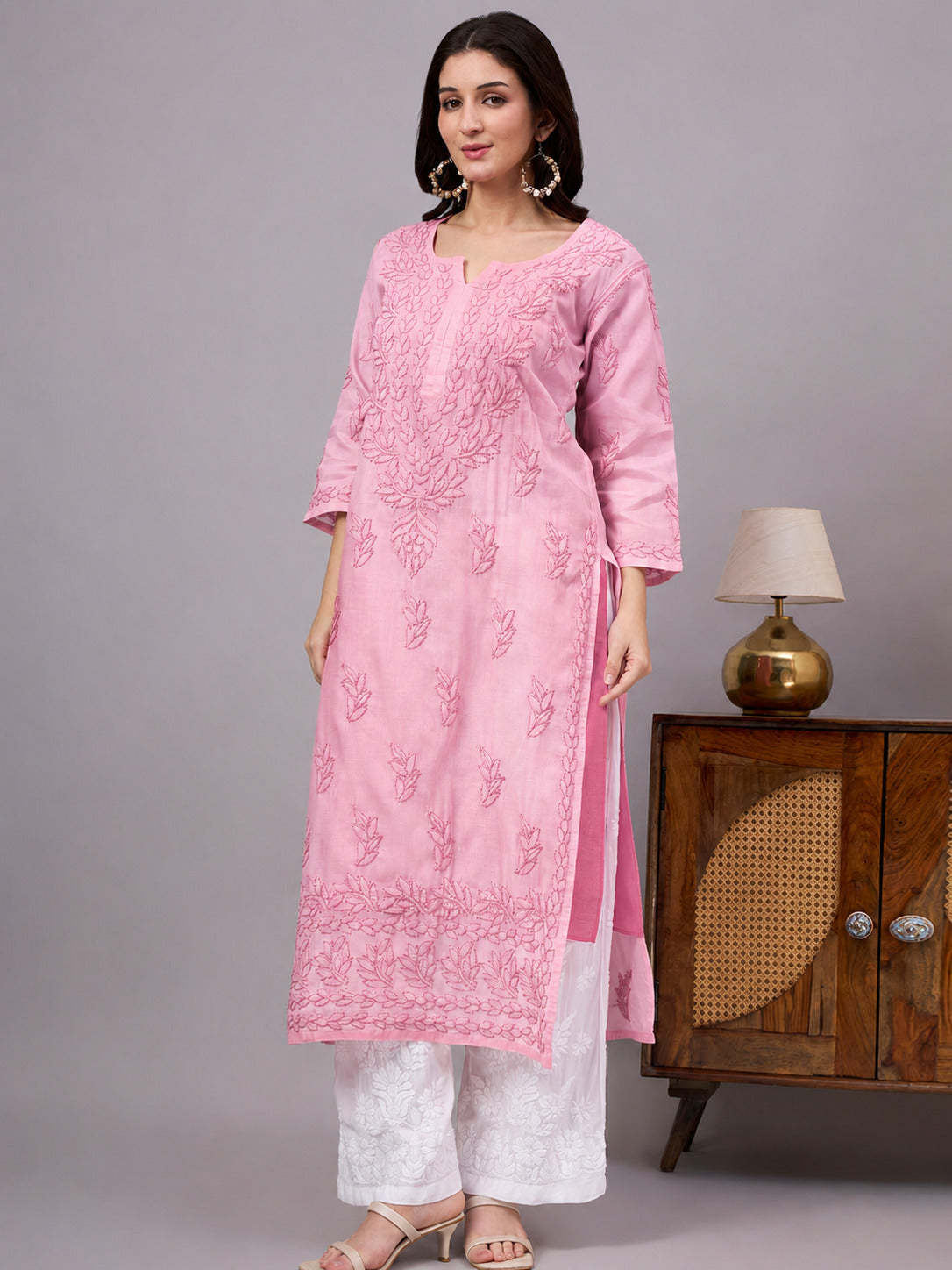 Comfortable regular wear Chikankari Kurta made from premium cotton fabric with handcrafted embroidery and an attached inner for enhanced comfort and coverage.