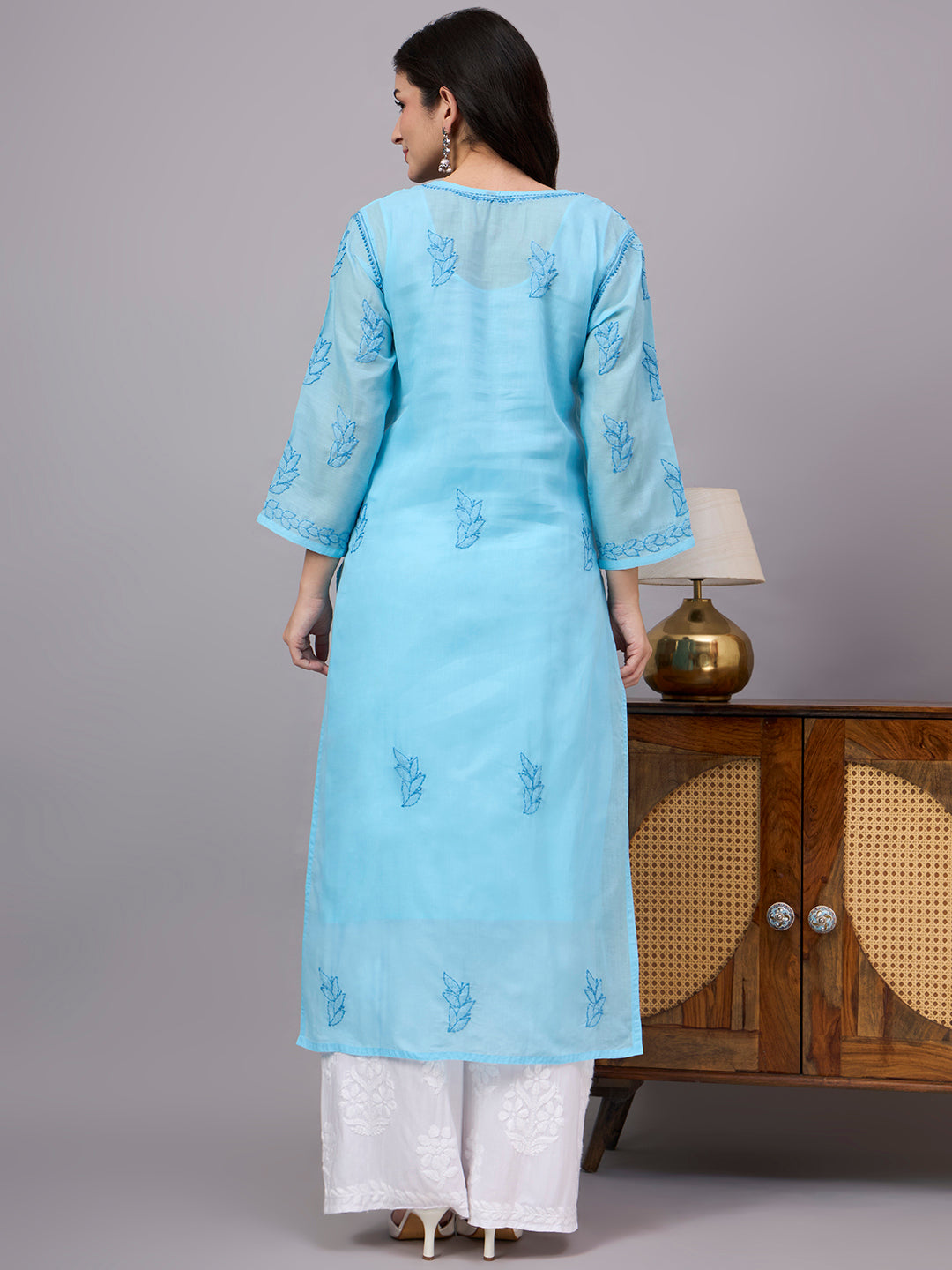 Elegant Chikankari Kurta crafted from premium cotton with a soft attached inner, showcasing traditional Lucknow embroidery for timeless ethnic fashion.