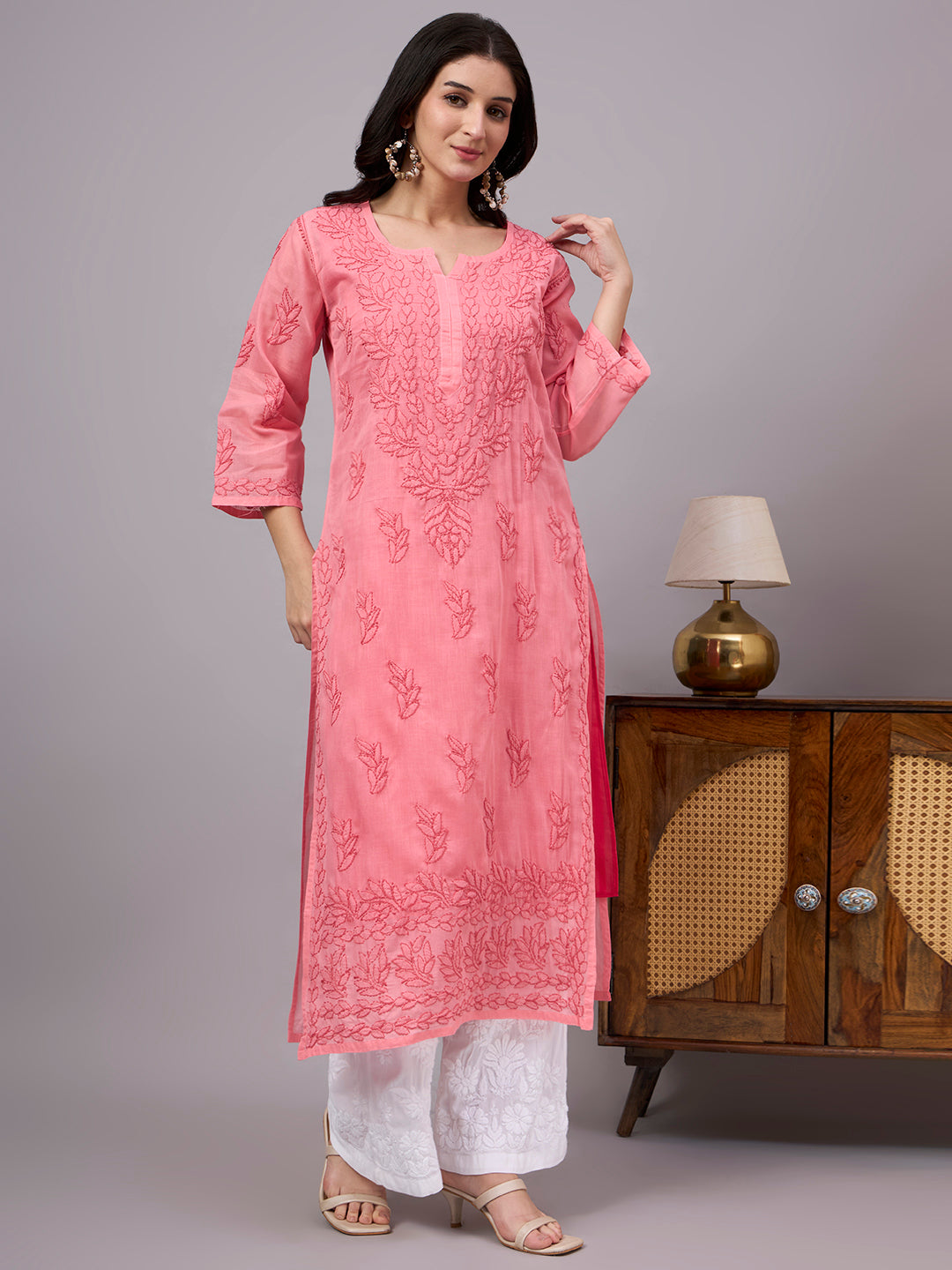 Women's handcrafted Chikankari Kurta made from breathable cotton fabric with detailed artisan embroidery and a comfortable regular fit for every occasion.
