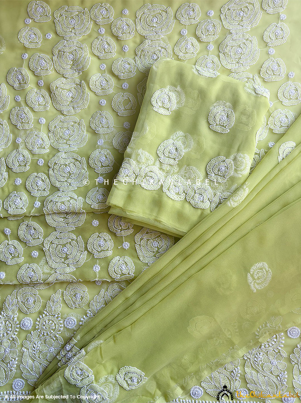 “Georgette chikankari suit material with dupatta highlighting traditional motifs and delicate threadwork”